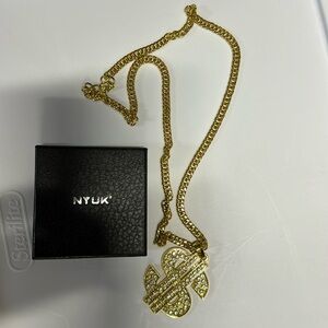 NYUK pendant.